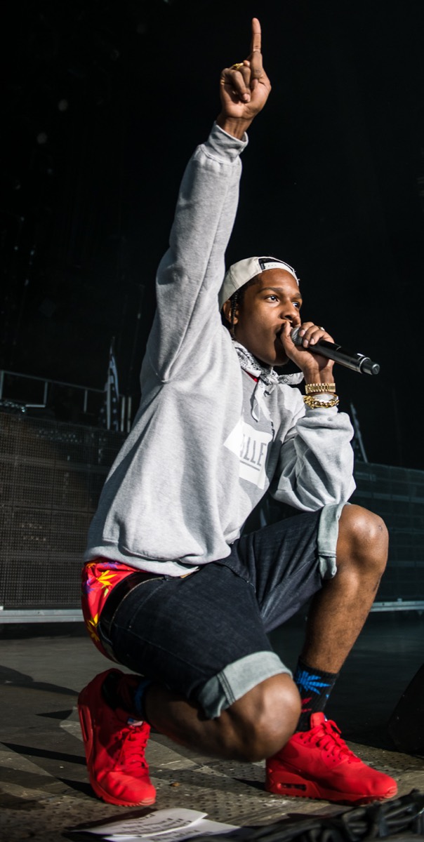 A$AP Rocky: Grey hoodie and red sneakers