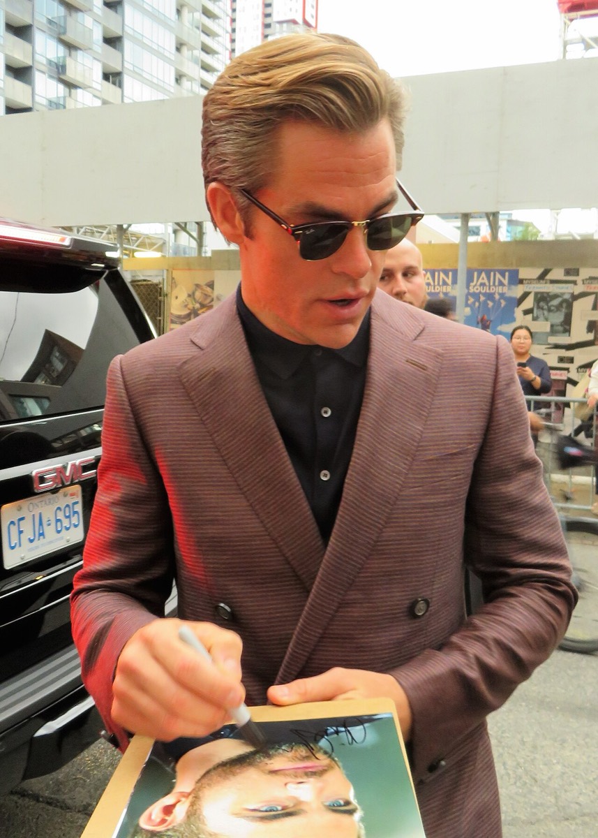 Chris Pine: Brown double-breasted suit and sunglasses