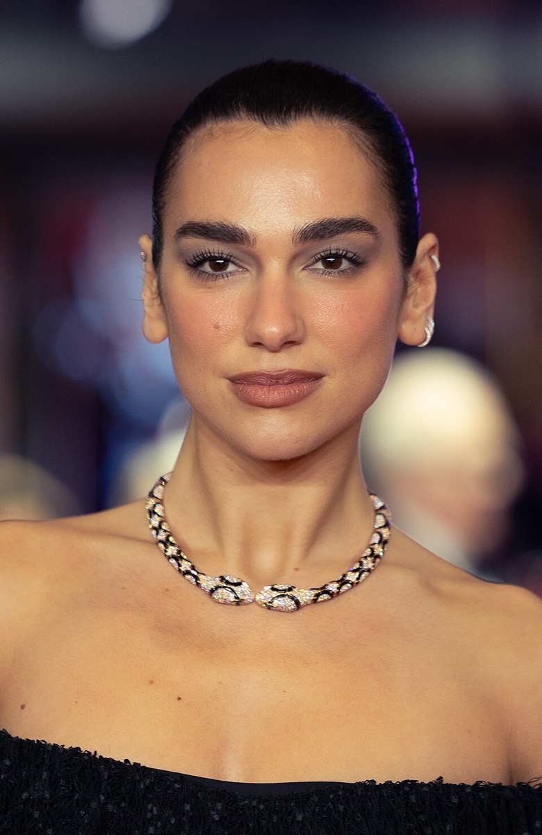 Dua Lipa: Statement necklace and black off-shoulder top
