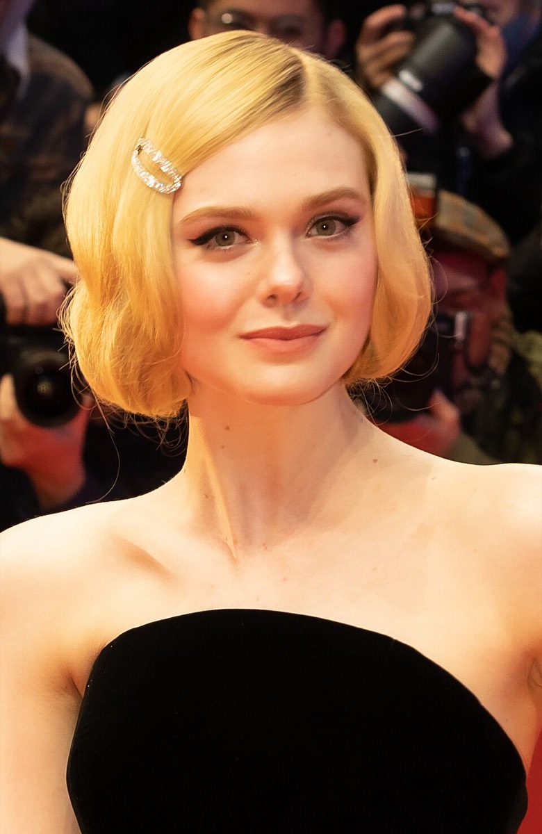 Elle Fanning: Black strapless dress and hair clip