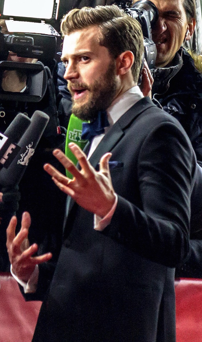 Jamie Dornan: Black suit and white shirt