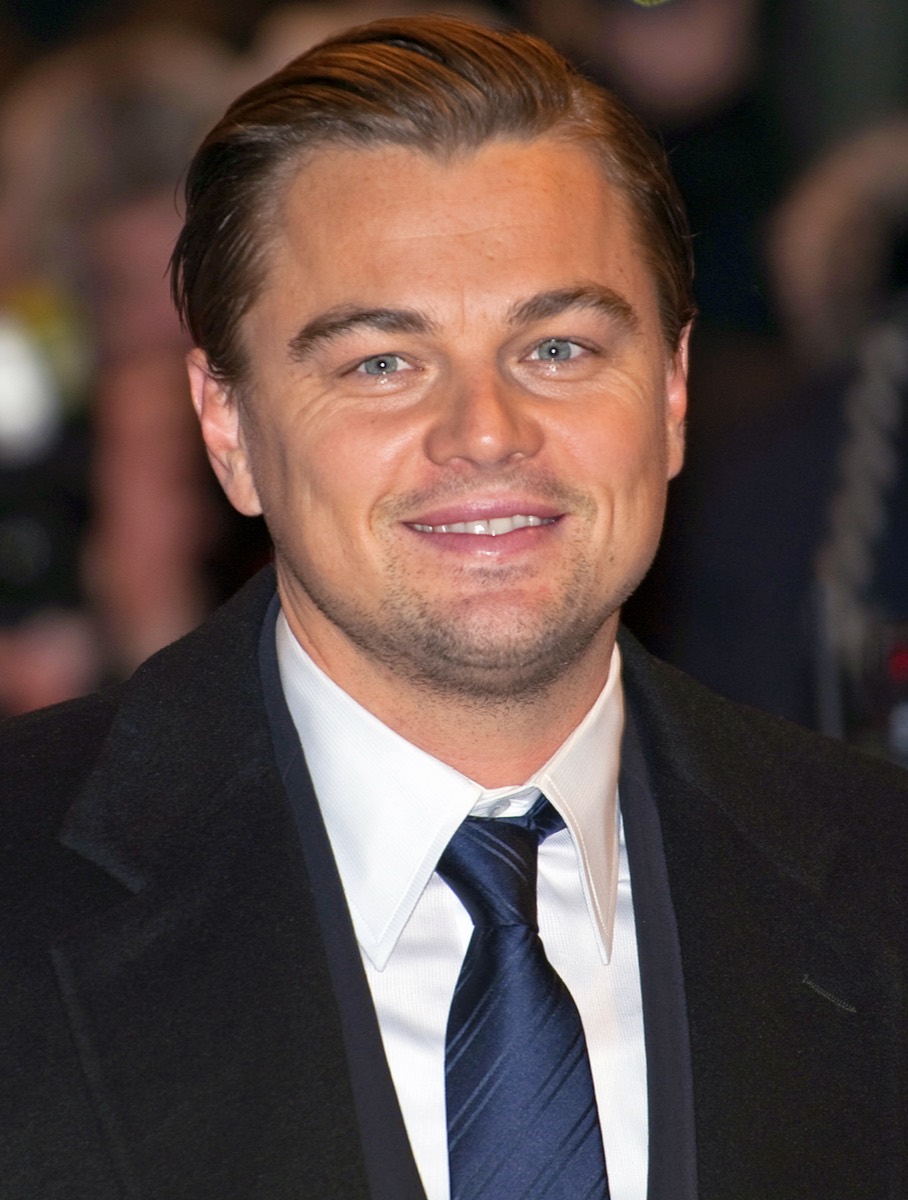 Leonardo DiCaprio: Black suit and striped navy tie