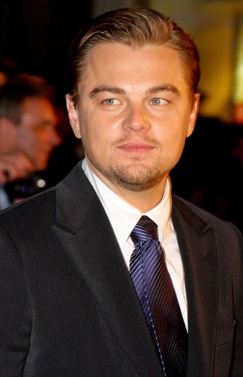 Leonardo DiCaprio: Black suit and navy striped tie
