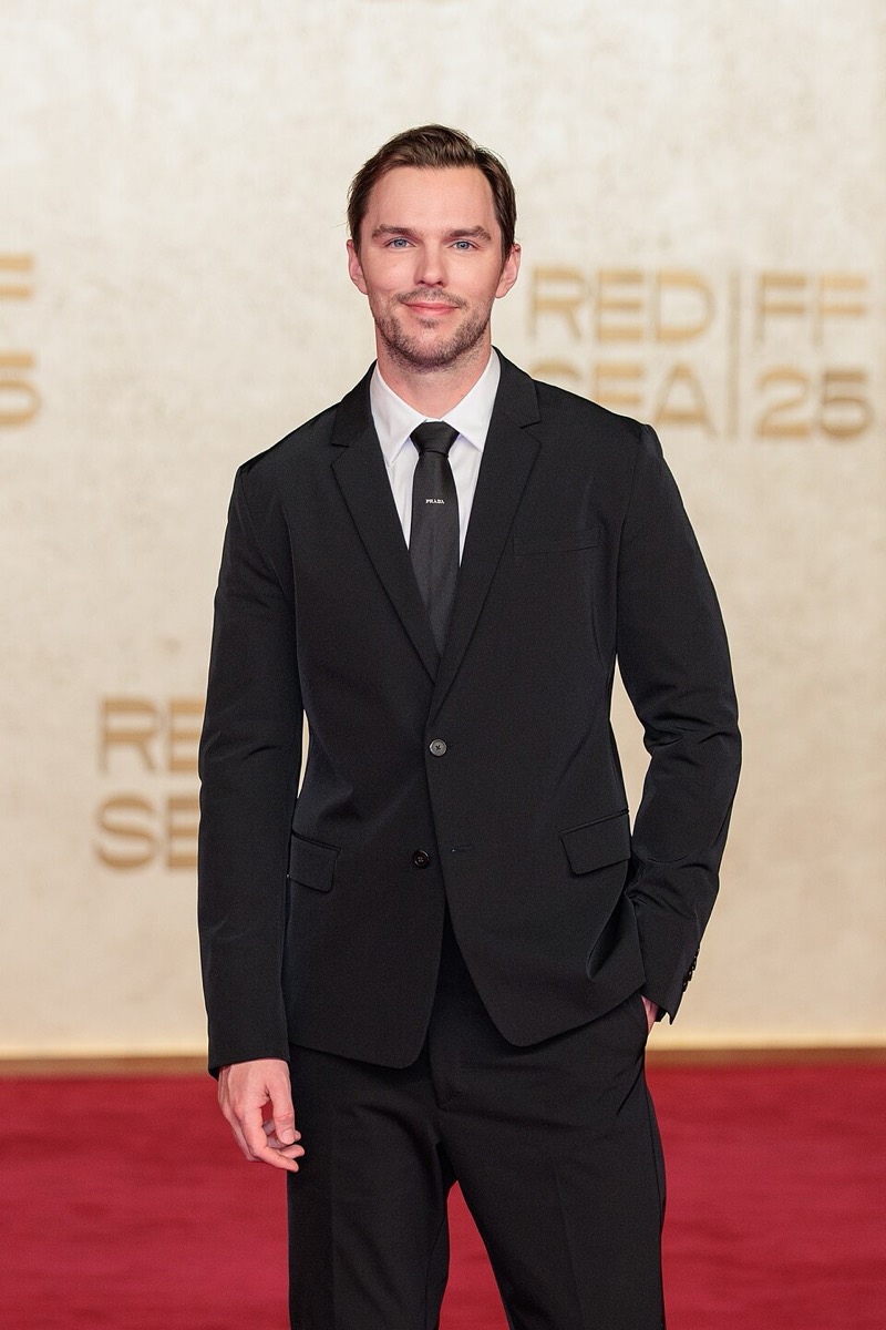Nicholas Hoult: Black suit and black tie