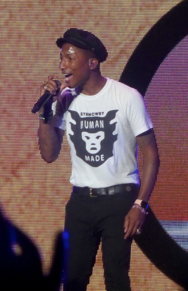 Pharrell Williams: Graphic tee and hat
